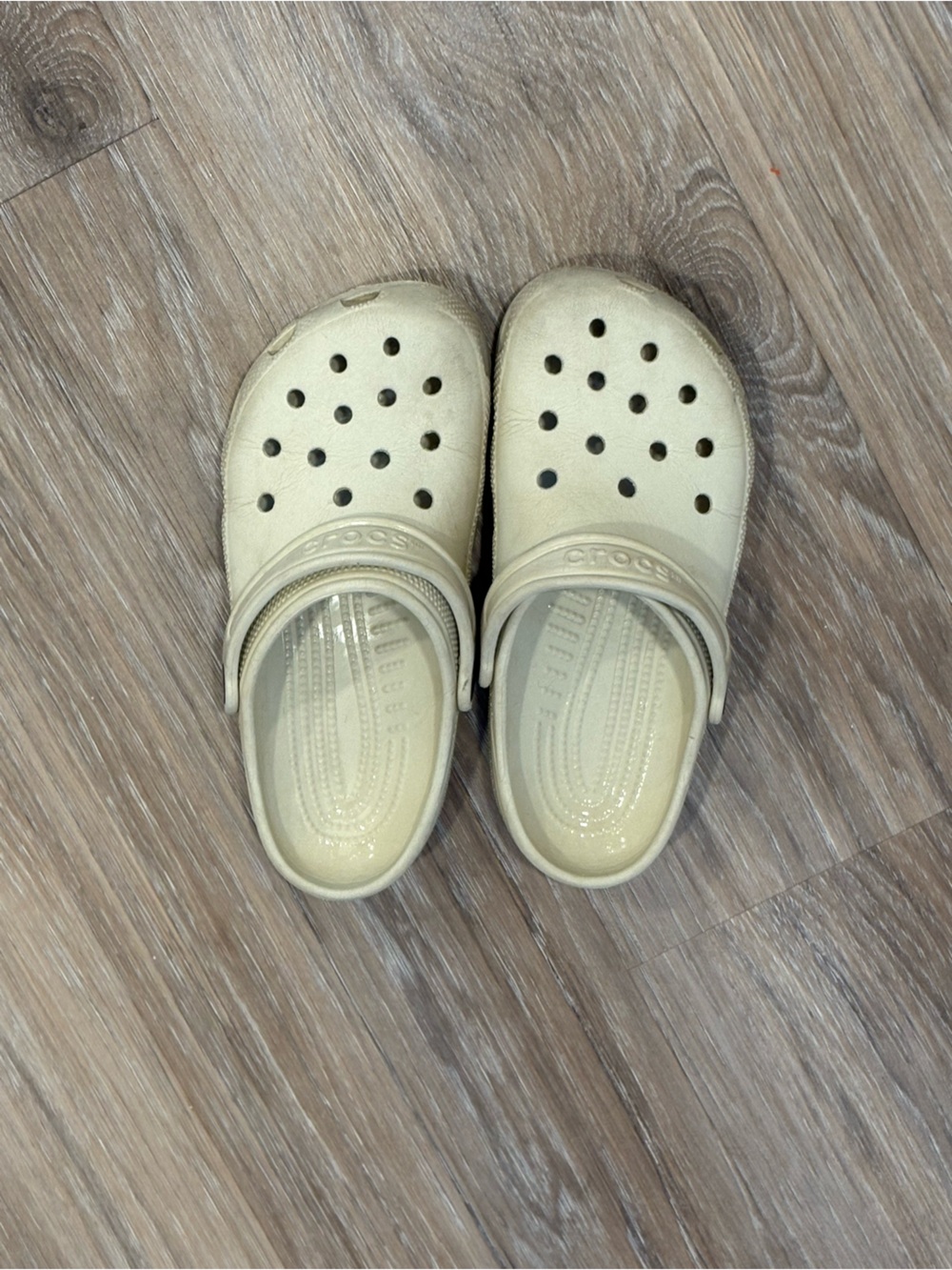 Kids size 3 cream crocs.